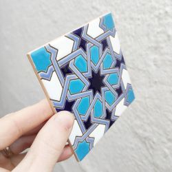 Azulejo 11 cm esmaltado con estrella geométrica azul