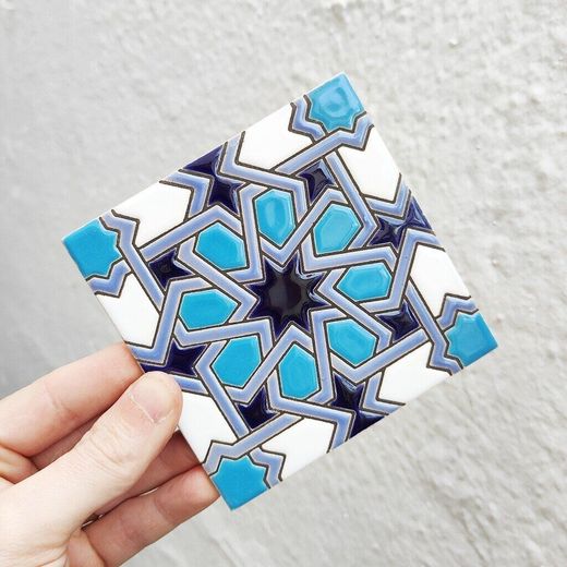 Azulejo 11 cm esmaltado con estrella geométrica azul